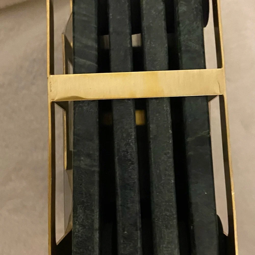 Dark green marbled ceramic coasters with gold holder. 4x4